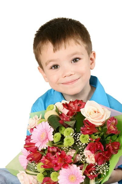 Um menino com buquê de flor — Fotografia de Stock