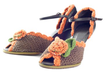 Pair of knitted shoes clipart