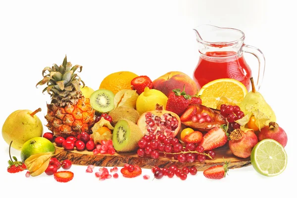 Fresh fruits and red juice — Stock Photo, Image