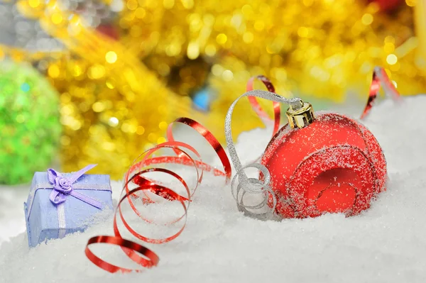 Christmas baubles and ribbons — Stock Photo, Image