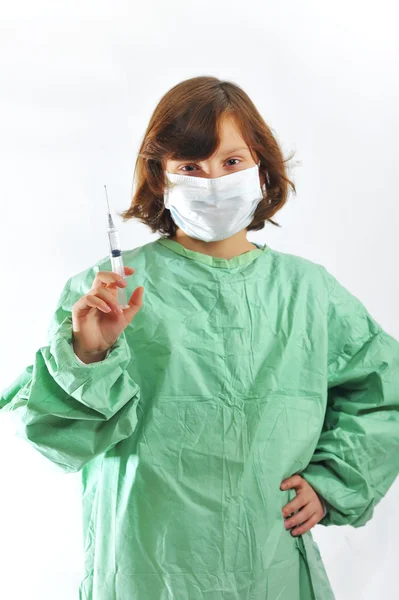 Doktůrek dívka s injekční stříkačkou — Stock fotografie