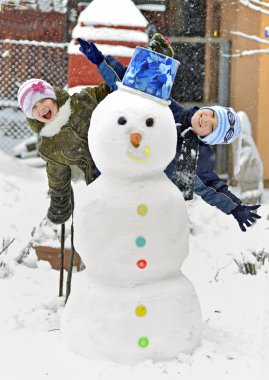 Snowman and kids clipart