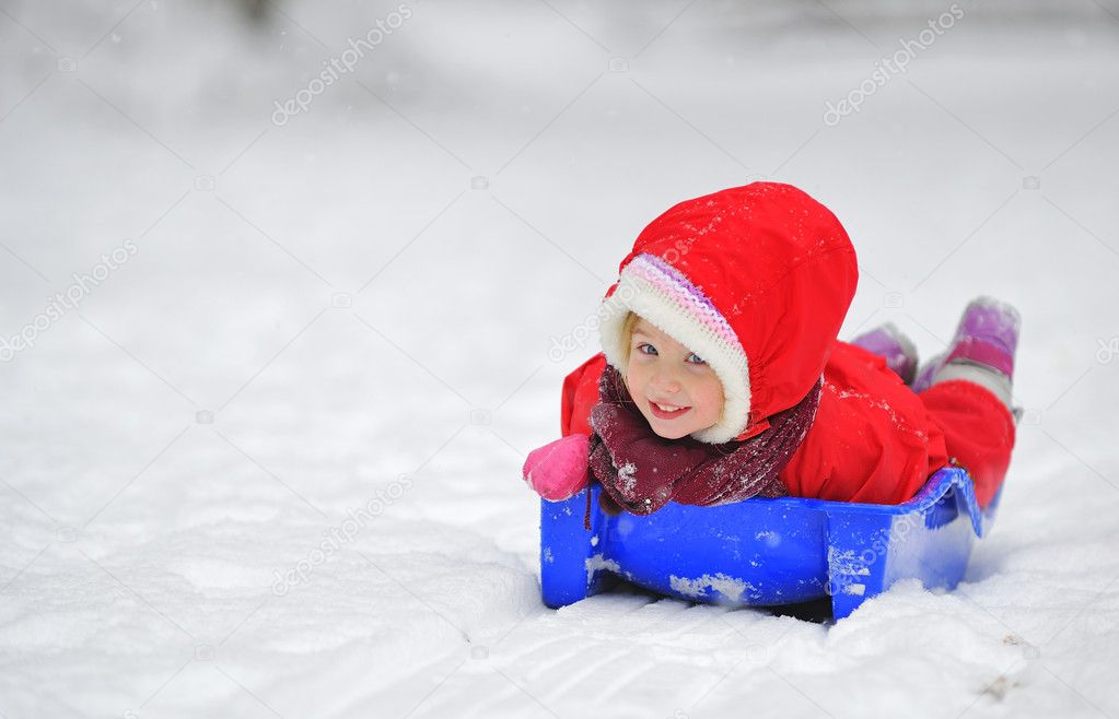 Girl on sleigh