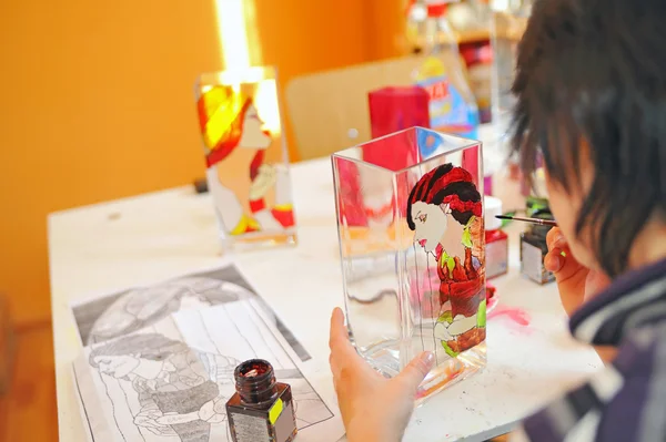stock image Girl painting a vase