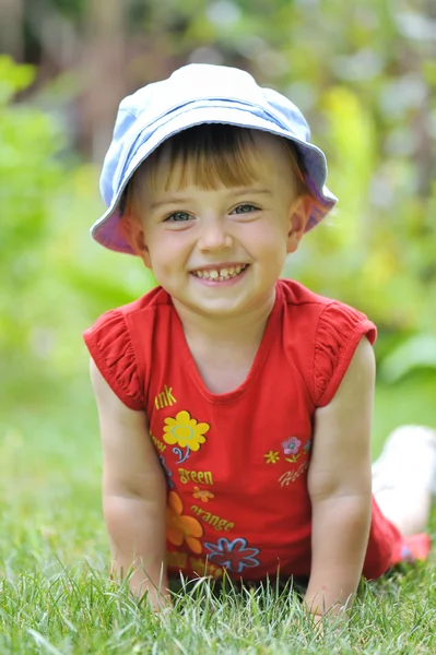 Little girl on grass — Stock Photo, Image