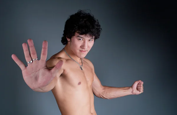 Jovem asiático homem parar mão irritado retrato — Fotografia de Stock