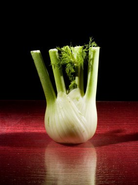 photo of fennel on red glasstable clipart