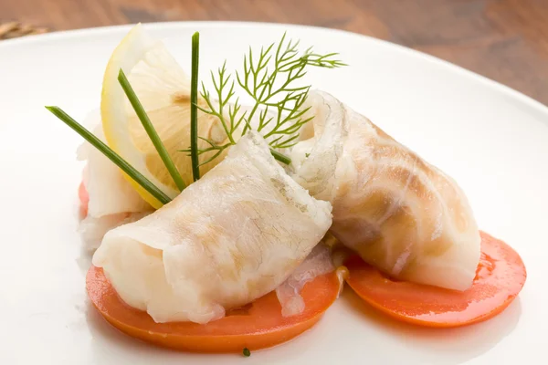 Sea Bass rolls with tomatoes — Stock Photo, Image