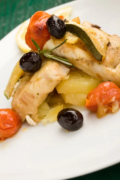 Baked Cod with olives and tomatoes — Stock Photo, Image