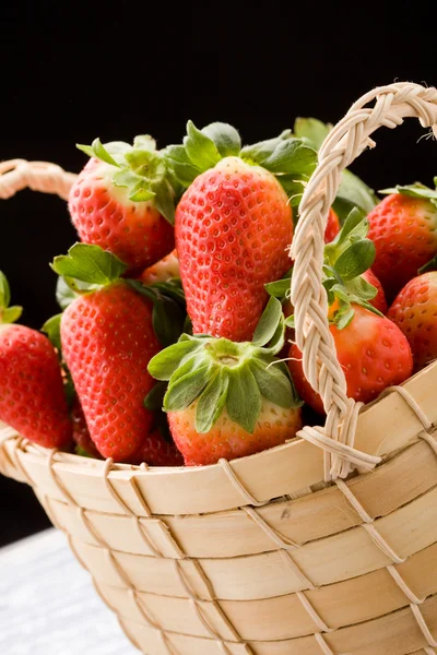 Strawberries inside a basket — Stock Photo, Image