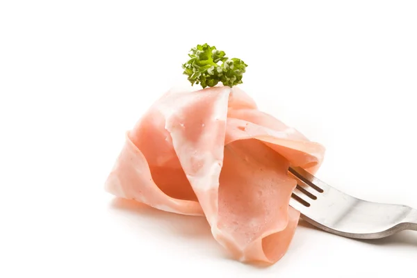 Fork with thin slice of mortadella — Stock Photo, Image