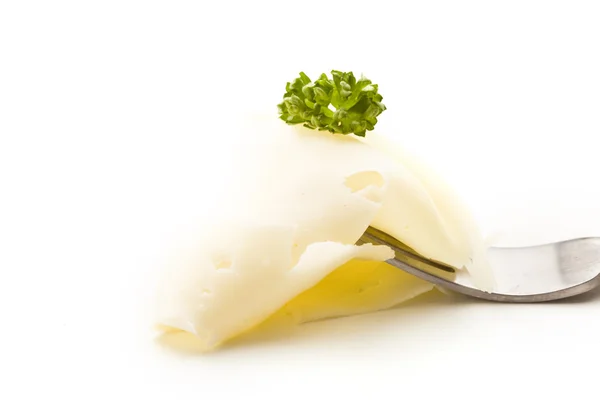 Rebanada de queso con perejil en tenedor —  Fotos de Stock
