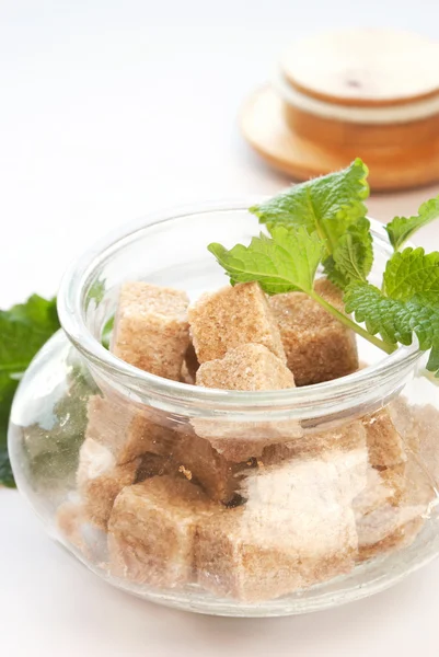 Brown sugar in glass bowl Stock Picture