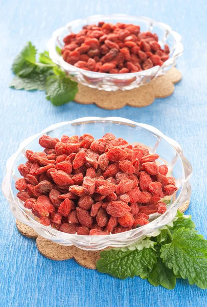 Piros szárított goji bogyós gyümölccsel Stock Fotó