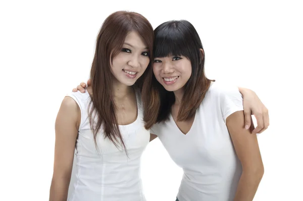 Two Asian Friends Isolated White Background Royalty Free Stock Images