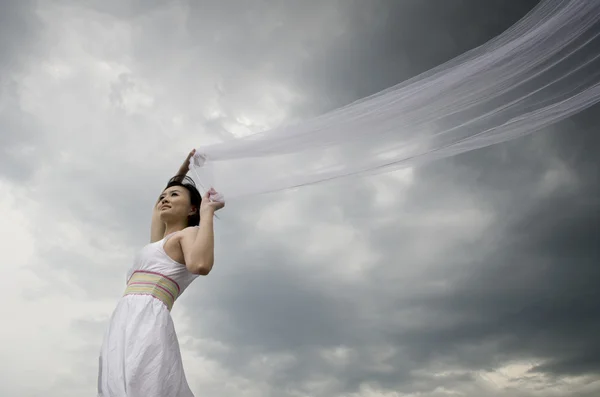 stock image Asian bride holding viels