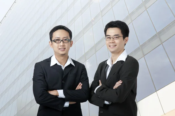 Business team with office background — Stock fotografie
