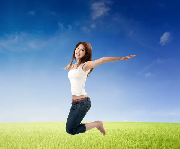 Asian girl jumping — Stock Photo, Image