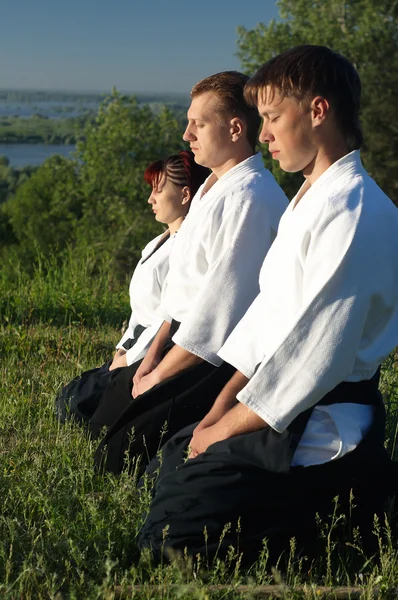 Üç genç aikido adam — Stok fotoğraf