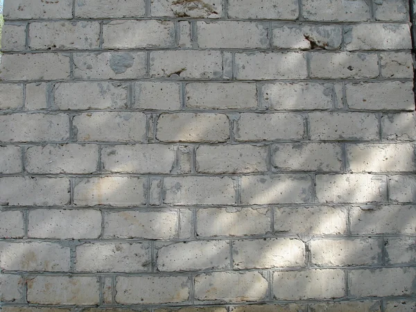 Mauer aus weißen Ziegeln — Stockfoto