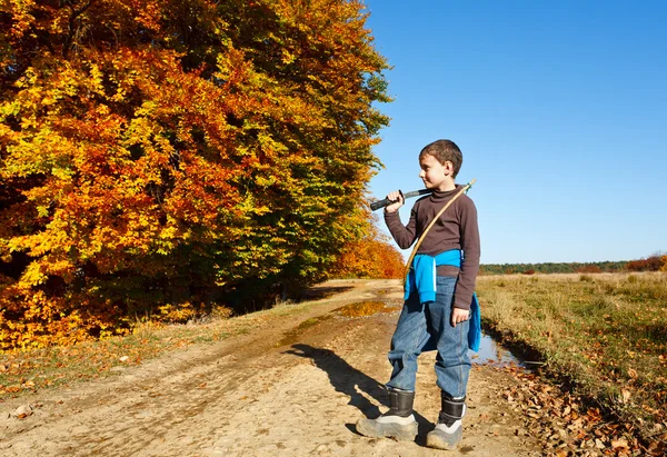 Boy playing outdoor — Stock Photo, Image