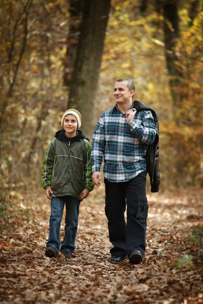 Father and son taking a walk outdoor — Stock Photo, Image