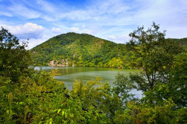 Landscape with lake and mountains clipart