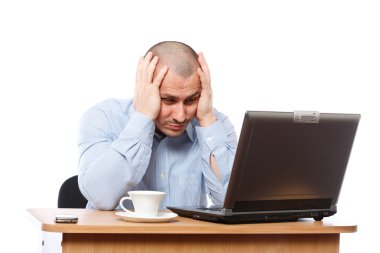 Stressed businessman at computer clipart