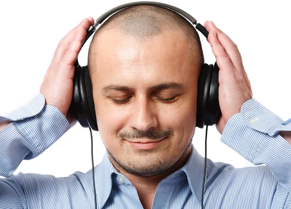 Businessman listening music — Stock Photo, Image
