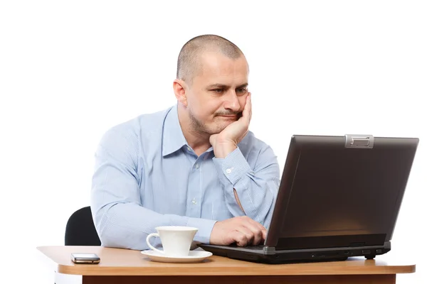 Stressed businessman at computer Stock Photo