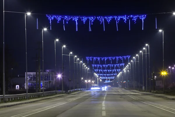 Strada con luci blu di notte — Foto Stock