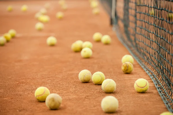 Tennis balls on a field — Stock Photo, Image