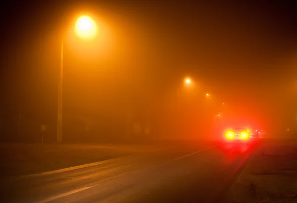 stock image Road in a very foggy night