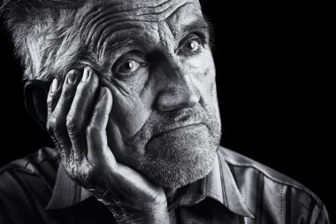 Monochrome stylized portrait of an expressive old man clipart