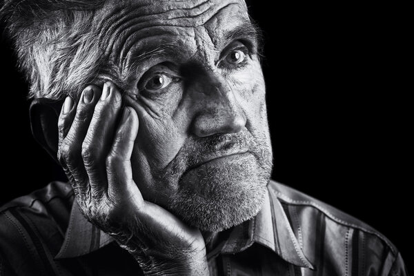 Monochrome stylized portrait of an expressive old man