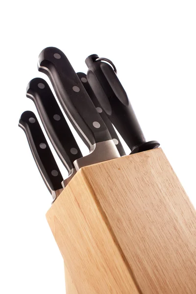 Närbild Uppsättning Köksknivar Ett Trä Rack Isolerad Vit Bakgrund — Stockfoto