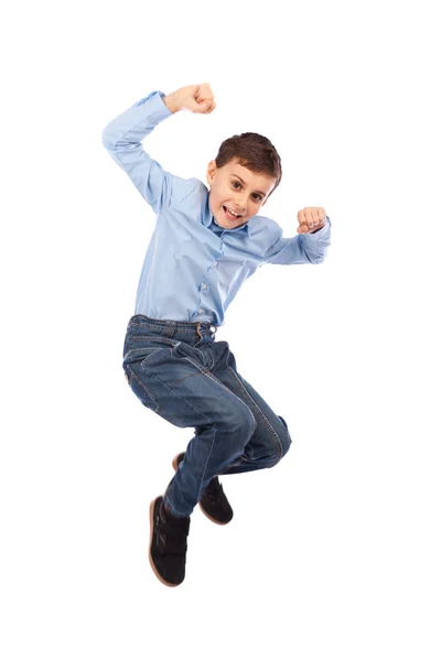 Criança feliz pulando de alegria — Fotografia de Stock