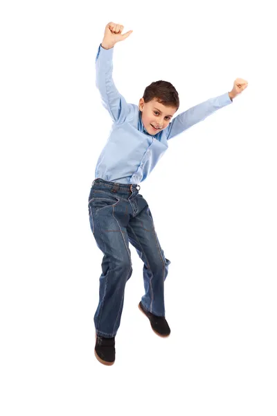 幸せな子供の白い背景で隔離の喜びのためにジャンプ — ストック写真
