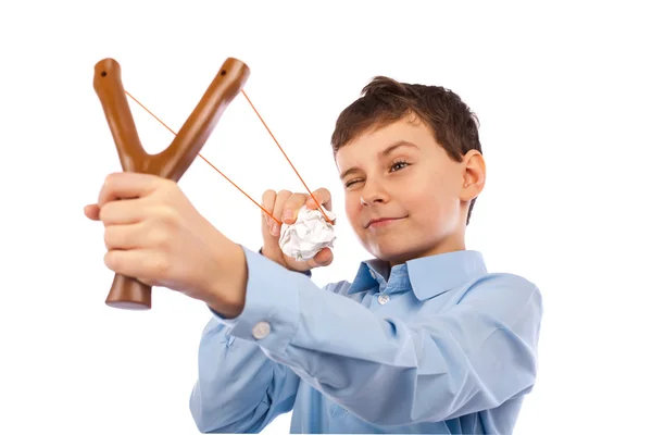 stock image Boy sending messages on crumpled paper with slingshot