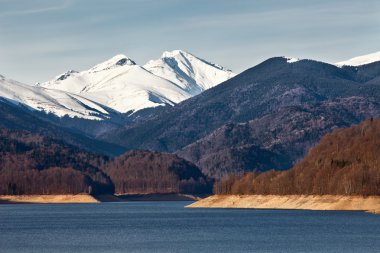 Landscape with lake and mountains clipart