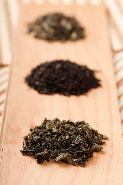Closeup Three Piles Dried Leaves Tea Type Jiaogulan Black Green — Stock Photo, Image