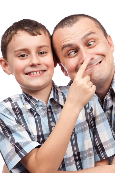 Pai e filho fazendo caras engraçadas — Fotografia de Stock