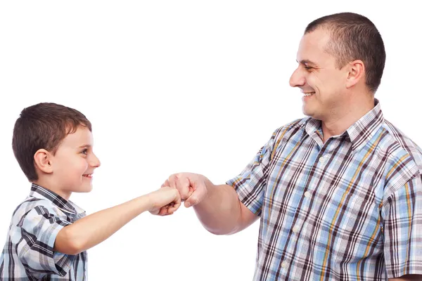 Vater und Sohn mit einer Art High-Five-Salut — Stockfoto