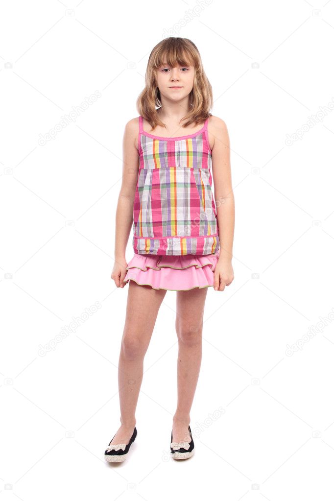 Little girl standing, isolated on white