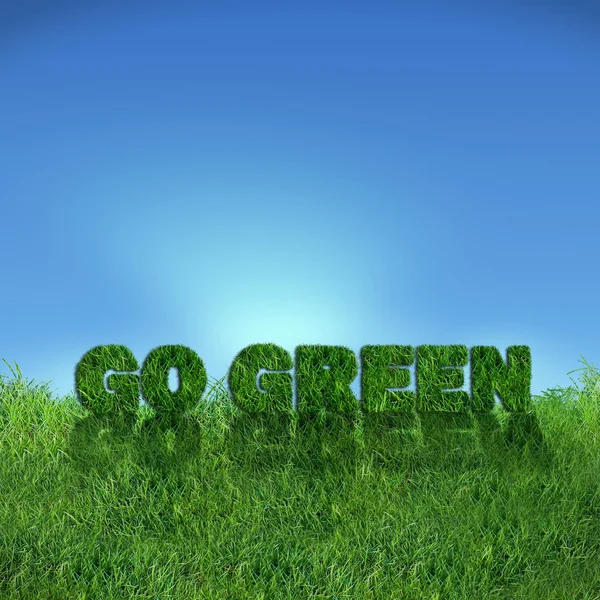 Teksturowane Przejdź Zielony Znak Świeżej Trawy Jasne Tło Niebieskie Niebo — Zdjęcie stockowe