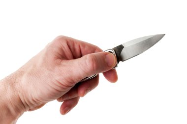 erkek eli elinde bir bıçak