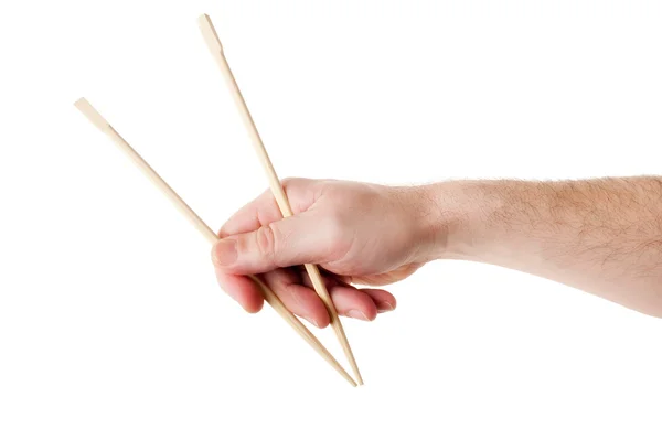 Male Hand Holding a Pair of Chopsticks — Stock Photo, Image