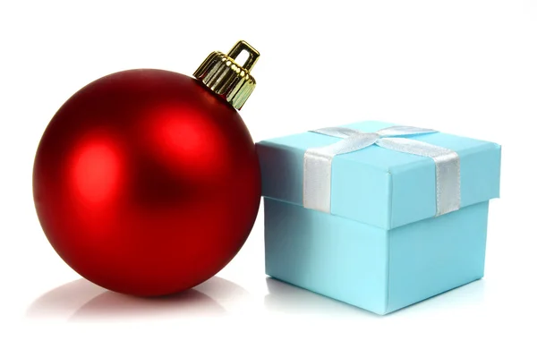 Christmas ball and small box for a gift — Stock Photo, Image
