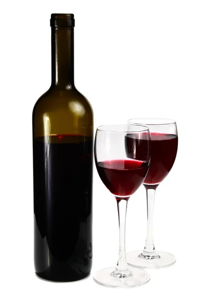 Flaskan med rödvin och glas — Stockfoto