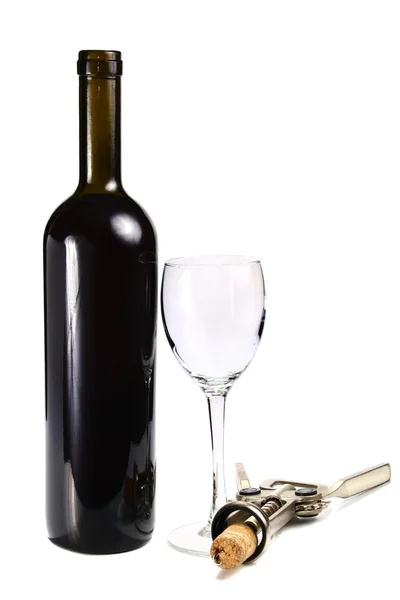 Botella con vino tinto y copa —  Fotos de Stock